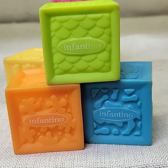 Fisher Price Roly Poly Chime Ball, Shape sorter, Infantino rubber blocks - Picture 6 of 9